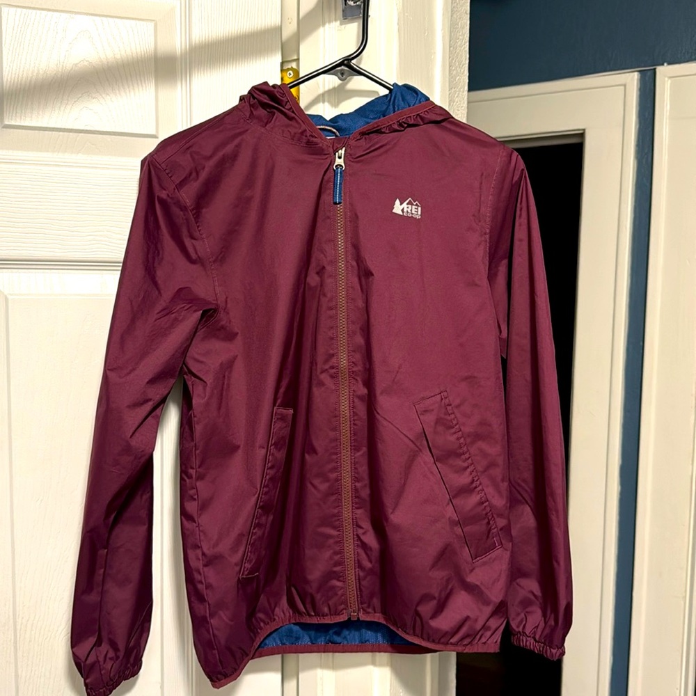 REI kids Large (14-16) rain jacket. Worn once! Perfect shape & ready for fun!
